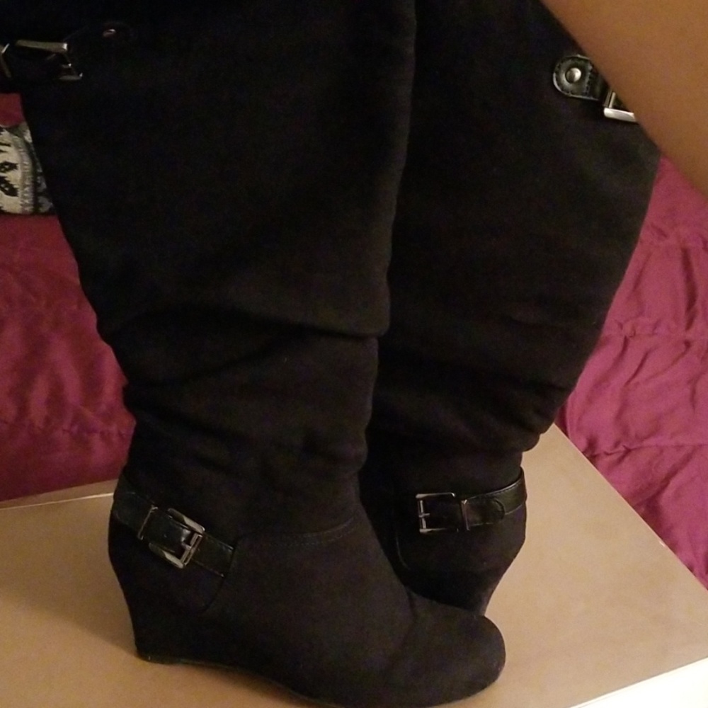 Black boots with small wedge